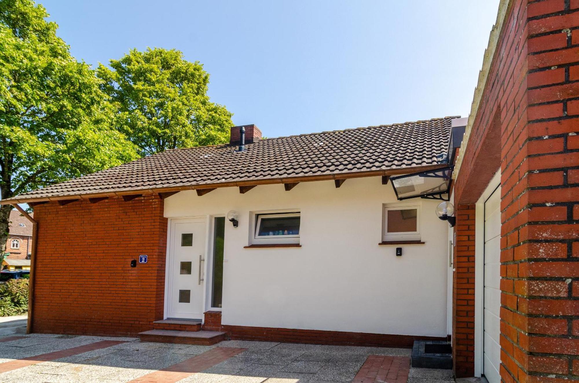 Ferienhaus Sonnenschein - Wohnung 1 Norden Bagian luar foto